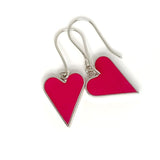 Heart-shaped earrings on a white background